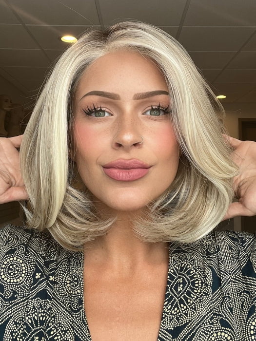 Madeline is wearing HAUTE by JON RENAU in 101/88/27S8 CATALINA BLONDE | Pale blonde with Pure White Natural Violet halo highlights, shaded medium brown 