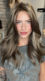 Madeline wearing OLIVIA BY JON RENAU in 10RH16 CAFFE MOCHA | Light Brown with 33% Light Natural Blonde Highlights