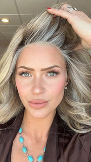 Madeline is wearing FLIP THE SCRIPT by RAQUEL WELCH in RL17/23SS ICED LATTE MACCHIATO | Honey Blonde shaded with Cool Blonde