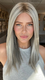 Madeline is wearing SLEEK by ELLEN WILLE in METALLIC BLONDE ROOTED 101.60.51 | Pearl Platinum, Pearl White, and Grey Blend with Shaded Roots