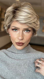 Madeline is wearing ANNE by JON RENAU in FS17/101S18 PALM SPRINGS BLONDE | Light Ash Blonde with Pure White Natural Violet Bold Highlights, Shaded with Dark Natural Ash Blonde