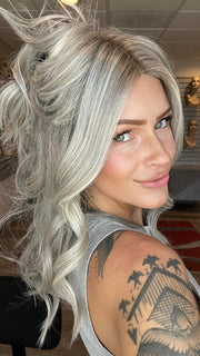 Madeline is wearing SLEEK by ELLEN WILLE in METALLIC BLONDE ROOTED 101.60.51 | Pearl Platinum, Pearl White, and Grey Blend with Shaded Roots (STYLED)