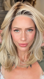 Madeline wearing DREW by JON RENAU in 22F16S8 VENICE BLONDE | Light Ash Blonde and Light Natural Blonde Blend Shaded with Medium Brown