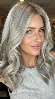 Madeline is wearing SLEEK by ELLEN WILLE in METALLIC BLONDE ROOTED 101.60.51 | Pearl Platinum, Pearl White, and Grey Blend with Shaded Roots (STYLED)