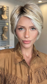 Madeline wearing LUNA by JON RENAU in 101/88/27S8 CATALINA BLONDE | Pale blonde with Pure White Natural Violet halo highlights, shaded medium brown 