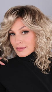 Roxie wearing color RH1488RT8 | Dark Blonde with Light Copper Blonde Highlights & Golden Brown Roots