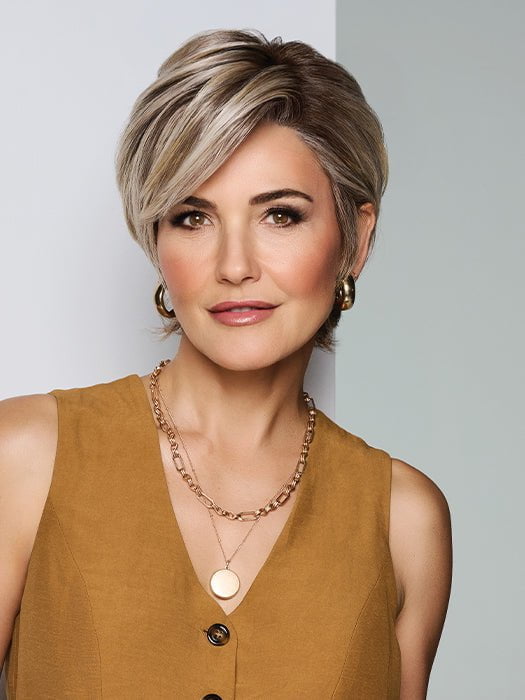 A layered boycut with face-framing bangs and tapered sides for a polished look