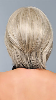Model is wearing TAILORED ALLURE in color L51/61 ICED GRANITA | Lightest Grey Progresses to a Deep Grey at the Nape