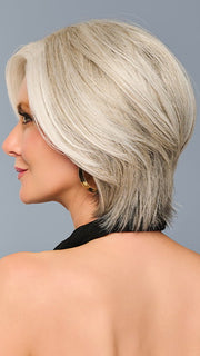 Model is wearing TAILORED ALLURE in color L51/61 ICED GRANITA | Lightest Grey Progresses to a Deep Grey at the Nape