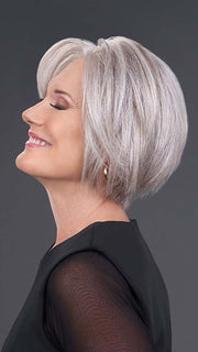 Model is wearing IGNITE HH in color 39/51/60 MIST | Pure White front with Light Natural Ash Brown with 75% Light Grey, graduating to Light Grey with 30% Dark Brown