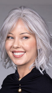 Model is wearing NAPLES by BELLETRESS in color OYSTER GRAY | A mixture of Lightest Gray and a hint of White