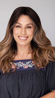 Roxie wearing BALAYAGE BEAUTY by RAQUEL WELCH in RL4/15OM | Dark brown blended roots that transition into a natural blonde ombré from midlength to the ends