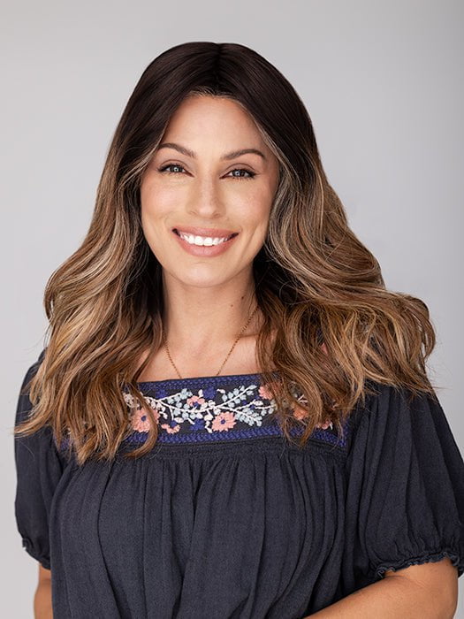 Roxie wearing BALAYAGE BEAUTY by RAQUEL WELCH in RL4/15OM | Dark brown blended roots that transition into a natural blonde ombré from midlength to the ends