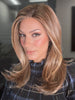 Roxie is wearing CHARMING by TRESSALLURE in color 17/23/R8 | Beige Blonde and Auburn Blended with Medium Brown Roots