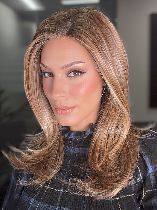 Roxie is wearing CHARMING by TRESSALLURE in color 17/23/R8 | Beige Blonde and Auburn Blended with Medium Brown Roots