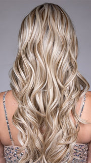 Model is wearing SOPHIA by BELLETRESS in color BUTTERBEER R | Dark Brown Base and Root that transitions smoothly into a buttery blonde, infused with creamy honey and toffee tones