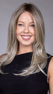 Model is wearing SPEARS in COOL CHAI BLONDE-R | A balanced cool blonde with softly contrasted darker roots, a fresh twist on classic blonde tones.