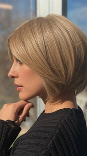 Roxie wearing STRAIGHT UP WITH A TWIST ELITE By RAQUEL WELCH in RL14/22 PALE GOLDEN WHEAT | Dark Blonde Evenly Blended with Platinum Blonde 
