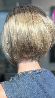 Model is wearing SHELBY by JON RENAU in color 24BT18S8 SHADED MOCHA | Medium Natural Ash Blonde & Light Natural Gold Blonde Blend, Shaded with Medium Brown