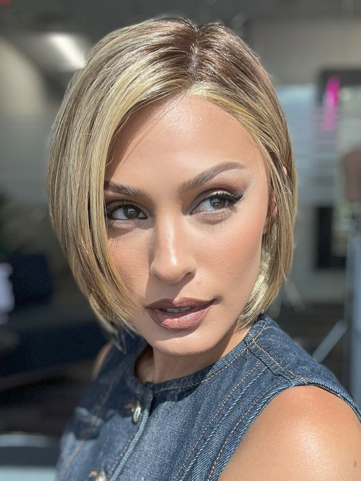Model is wearing SHELBY by JON RENAU in color 24BT18S8 SHADED MOCHA | Medium Natural Ash Blonde & Light Natural Gold Blonde Blend, Shaded with Medium Brown