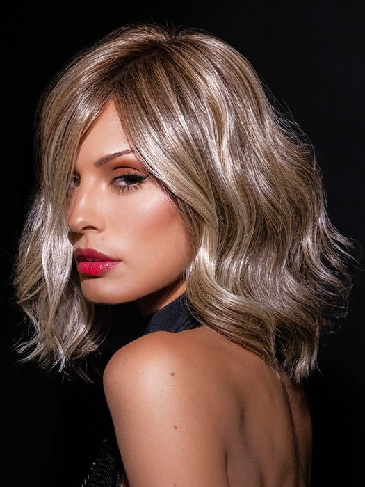 Roxie wearing SIMMER by RAQUEL WELCH in RL12/22SS SHADED CAPPUCCINO | Light Golden Brown Evenly Blended with Cool Platinum Blonde Highlights with Dark Roots