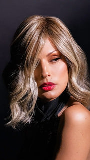 Roxie wearing SIMMER by RAQUEL WELCH in RL12/22SS SHADED CAPPUCCINO | Light Golden Brown Evenly Blended with Cool Platinum Blonde Highlights with Dark Roots