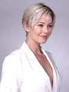 Model is wearing SOHO in CRUSHED ALMOND BLONDE R | A soft Neutral Light Blonde with a Light and Medium Blended Root Color