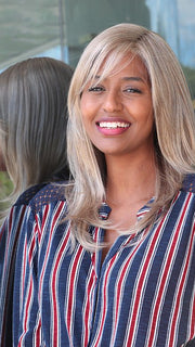 Sohia wearing STAR QUALITY by RAQUEL WELCH in R1621S+ GLAZED SAND | Dark Natural Blonde with Cool Ash Blonde Highlights on Top