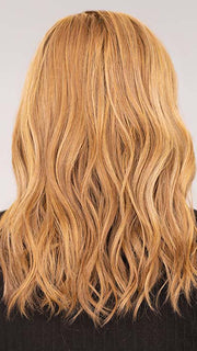 Sophia wearing Beach Wave Magic by TressAllure in color 14/26/R10 | Red Blonde with Gold Blonde highlights and Light Brown roots