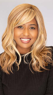 Sophia wearing Beach Wave Magic by TressAllure in color 14/26/R10 | Red Blonde with Gold Blonde highlights and Light Brown roots