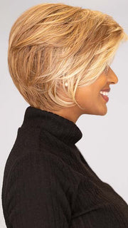 Sophia wearing PIXIE LITE by TRESSALLURE in color EL12/22/8: Light Golden Brown Evenly Blended with Platinum Blonde Highlights with Medium Brown Roots