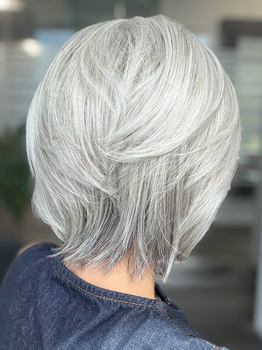Model is wearing TAILORED ALLURE by RAQUEL WELCH in color TAILORED ALLURE in color RL51/61 ICED GRANITA | Lightest Grey Progresses to a Deep Grey at the Nape