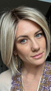 Jenny B. @thewiggygirl wearing Straight Up With a Twist Elite by Raquel Welch in color RL19/23SS SHADED BISCUIT | Light Ash Blonde Evenly Blended with Cool Platinum Blonde with Dark Roots