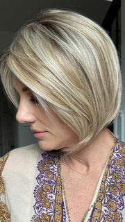 Jenny B. @thewiggygirl wearing Straight Up With a Twist Elite by Raquel Welch in color RL19/23SS SHADED BISCUIT | Light Ash Blonde Evenly Blended with Cool Platinum Blonde with Dark Roots