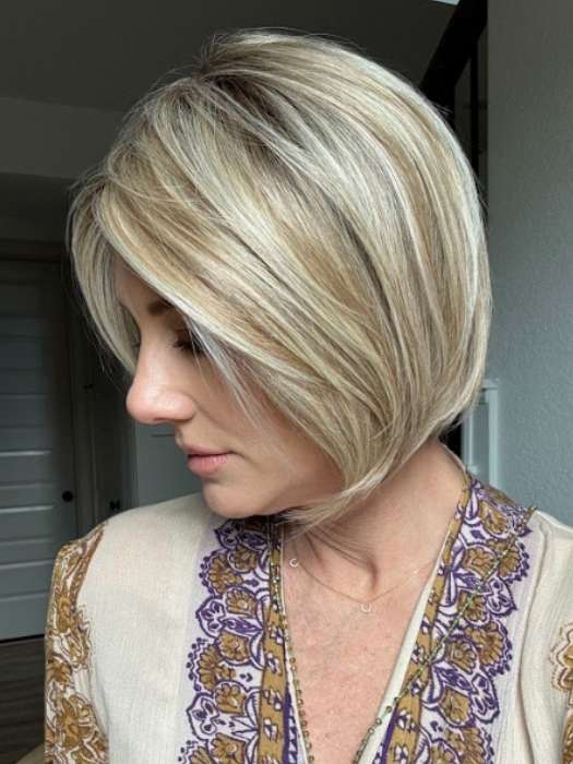 Jenny B. @thewiggygirl wearing Straight Up With a Twist Elite by Raquel Welch in color RL19/23SS SHADED BISCUIT | Light Ash Blonde Evenly Blended with Cool Platinum Blonde with Dark Roots
