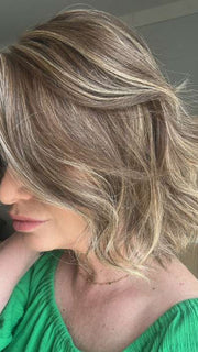 Emily H. @she_sheds_more wearing MISSONI by BelleTress in color TOASTED WALNUT R | Medium Brown Rooted, Ash Brown, Medium Gold Blonde, and Light Brown Blended to perfection