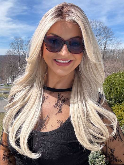Sandy @i_be_wiggin wearing FEATURE LENGTH by Raquel Welch in color RL16/22SS SHADED ICED SWEET CREAM | Pale Blonde with Slight Platinum Highlighting with Dark Roots