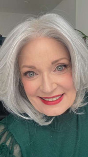 Mel B. @mels.be.ageless wearing UPSTAGE by RAQUEL WELCH WIGS in color RL56/60 SILVER MIST | Lightest Grey Evenly Blended with Pure White