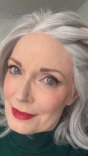 Mel B. @mels.be.ageless wearing UPSTAGE by RAQUEL WELCH WIGS in color RL56/60 SILVER MIST | Lightest Grey Evenly Blended with Pure White