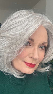 Mel B. @mels.be.ageless wearing UPSTAGE by RAQUEL WELCH WIGS in color RL56/60 SILVER MIST | Lightest Grey Evenly Blended with Pure White