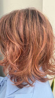 Mel B. @mels.be.ageless wearing DELIGHT by ELLEN WILLE in color ROSEWOOD ROOTED | Medium Brown, Caramel, and Rose Gold blend with Shaded Roots
