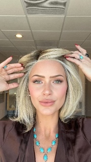 UPSTAGE by RAQUEL WELCH WIGS in color RL19/23SS SHADED BISCUIT | Light Ash Blonde Evenly Blended with Cool Platinum Blonde with Dark Roots 