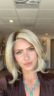 UPSTAGE by RAQUEL WELCH WIGS in color RL19/23SS SHADED BISCUIT | Light Ash Blonde Evenly Blended with Cool Platinum Blonde with Dark Roots 