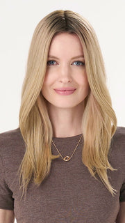 Model is wearing BARELY THERE STRAIGHT TOPPER in color PROSECCO | BROWN ROOTS WITH GOLDISH BLONDE HIGHLIGHTS