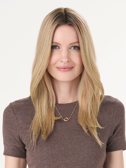 Model is wearing BARELY THERE STRAIGHT TOPPER in color PROSECCO | BROWN ROOTS WITH GOLDISH BLONDE HIGHLIGHTS