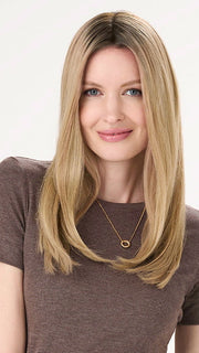 Model is wearing BARELY THERE STRAIGHT TOPPER in color PROSECCO | BROWN ROOTS WITH GOLDISH BLONDE HIGHLIGHTS