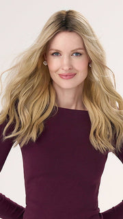 Model is wearing BARELY THERE WAVY 16" in color PROSECCO | BROWN ROOTS WITH GOLDISH BLONDE HIGHLIGHTS