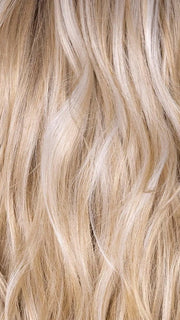 BISCOTTI CREME R | A soft, dimensional blonde shade that blends warm, golden-beige tones with light, creamy highlights for a sunlit, natural look. 