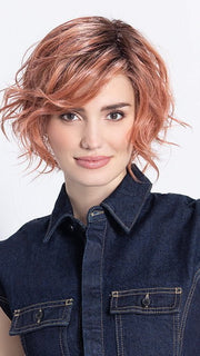 Model is in ROSE BLUSH ROOTED | Light copper, Peach, and Soft Rose Gold tones with subtle Golden Undertones and Shaded Roots