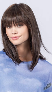 Model is wearing DARK CHOCOLATE ROOTED | Darkest/Dark Brown with Dark Auburn Blend and Shaded Roots